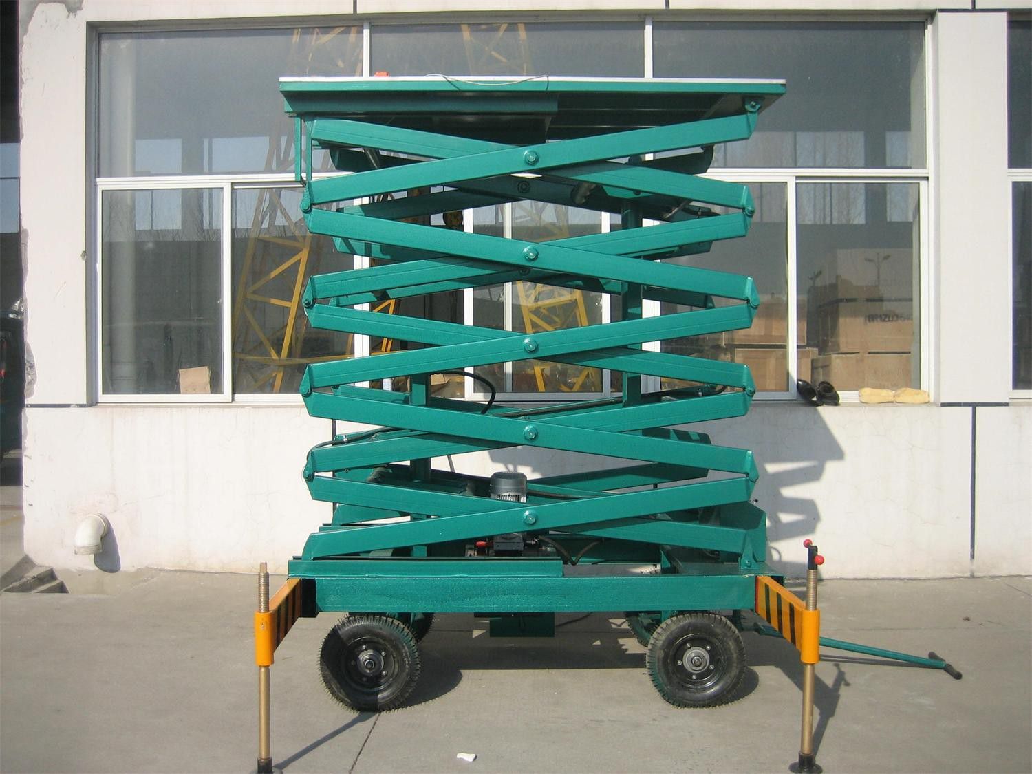 RuthScissor type hydraulic lifting platformWhat are the price and performance advantages